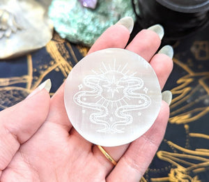 Engraved Selenite Palm Stone available at Goddess Provisions